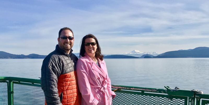 Lori and Todd on the Washington State Ferry with Mount Baker behind them