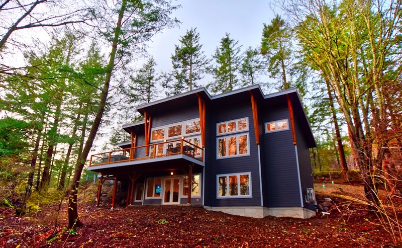 Rosario exterior, a modern two-story home in the trees