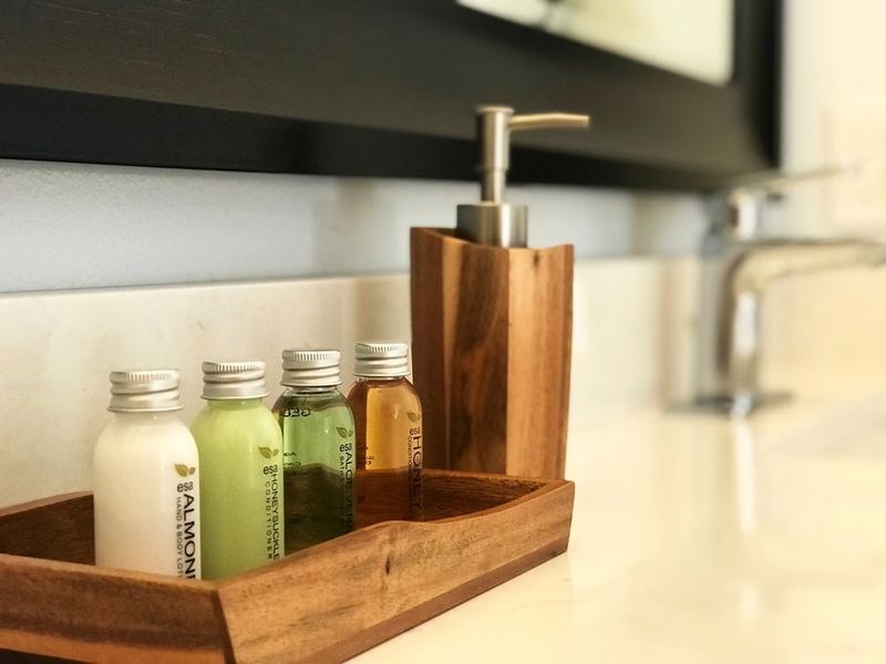 Bath amenities on a wooden tray