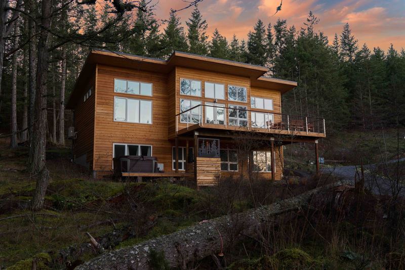 Rosario Sea Views exterior among firs