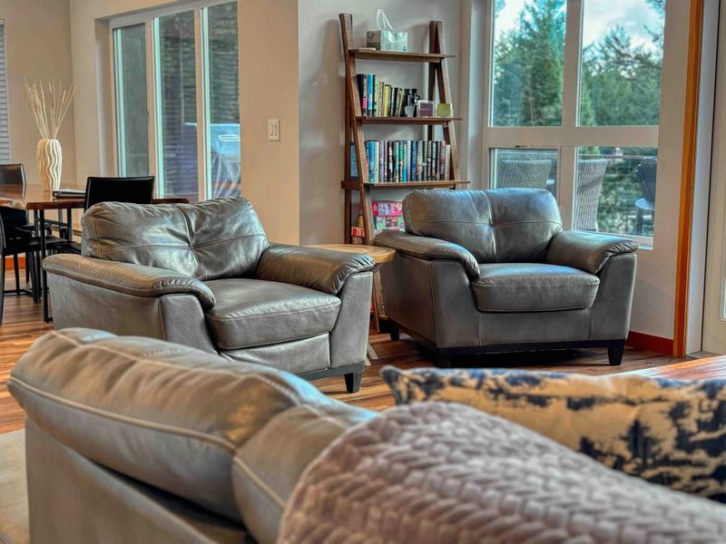 Sofa and chairs by the windows