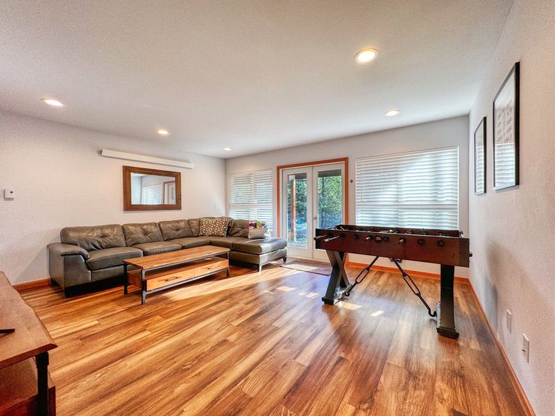 Rec room with sectional and foosball table
